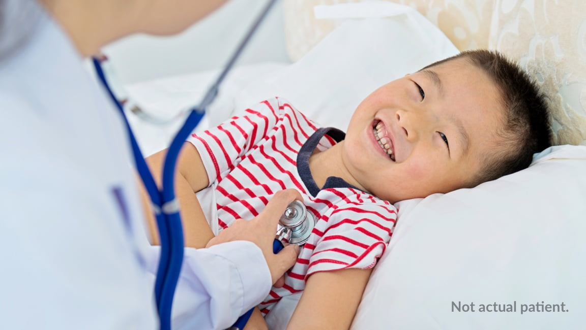 Hypothetical Doctor Using a Stethoscope on Child Patient