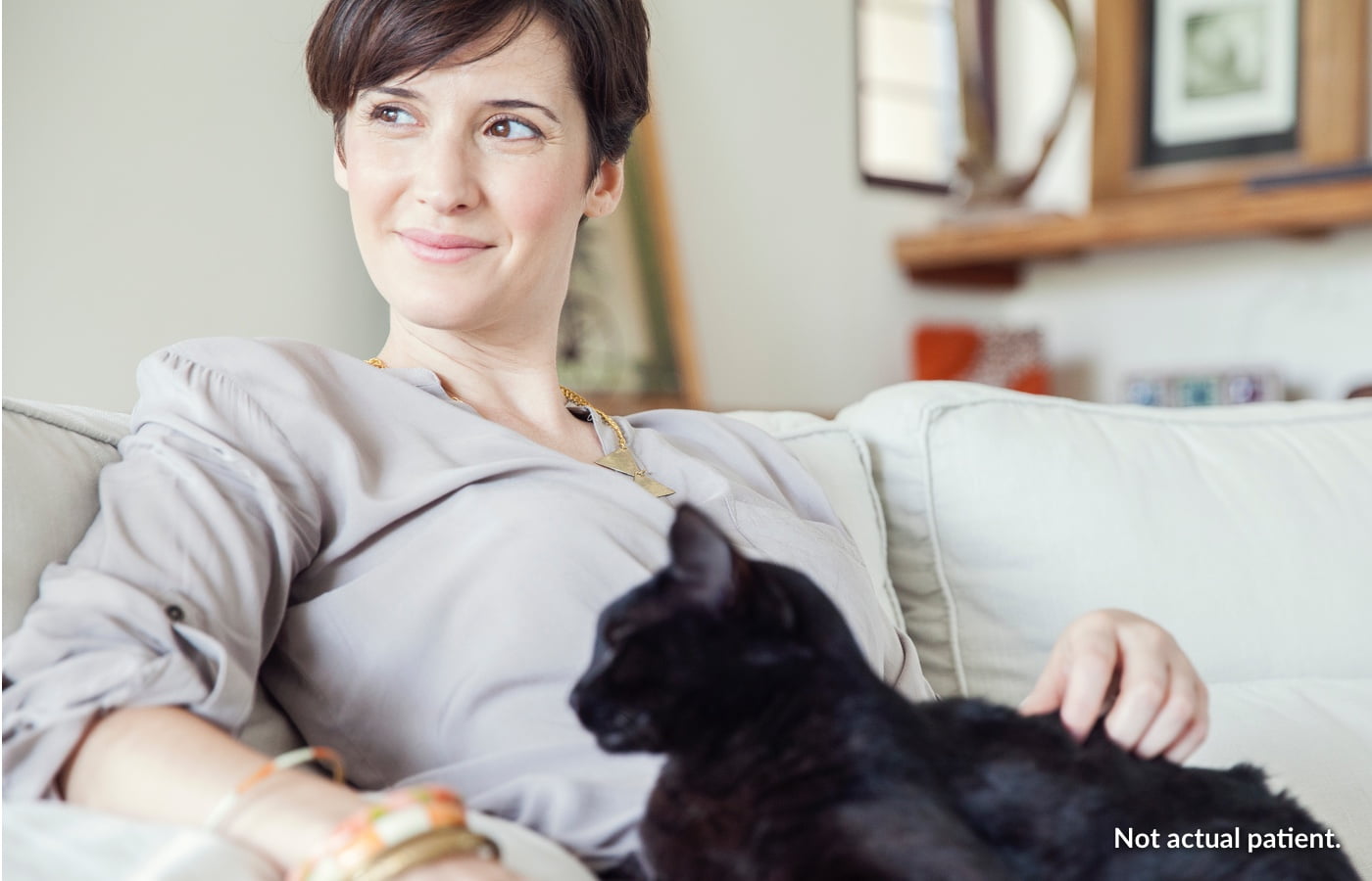 Woman Sitting with Cat